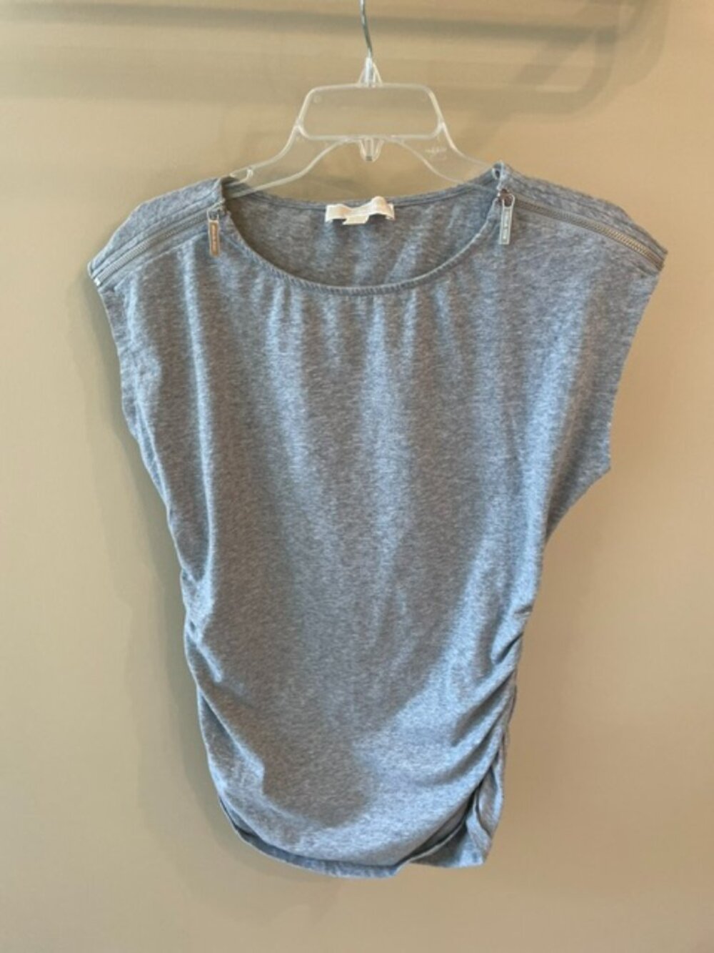 Women's Michael Kors jersey with zip shoulders and side rushing. Size large
